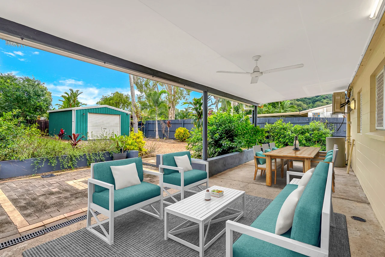 exterior-modern-living-dining-retouch-united-states Open-plan living and dining area with modern decor and balcony view, retouched for US real estate market.